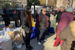 Al-Catanese-and-family-stand-next-to-Bishop-of-Brooklyn-to-hand-out-turkeys-with-CCBQ.