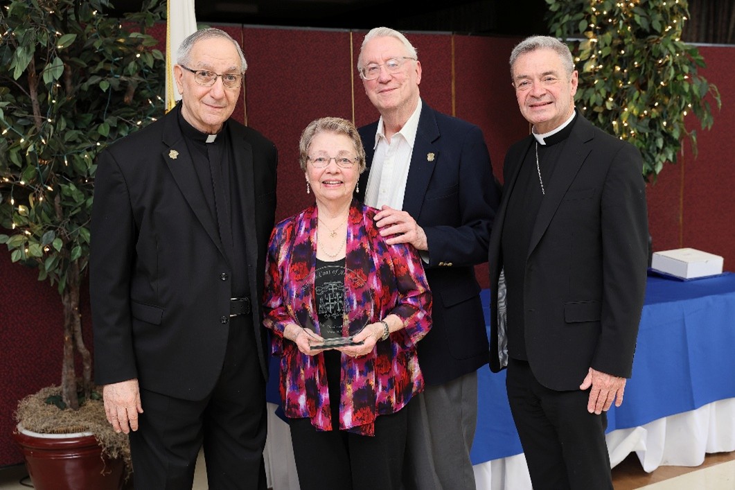 Bishop's Coat of Arms Club Catholic Charities News
