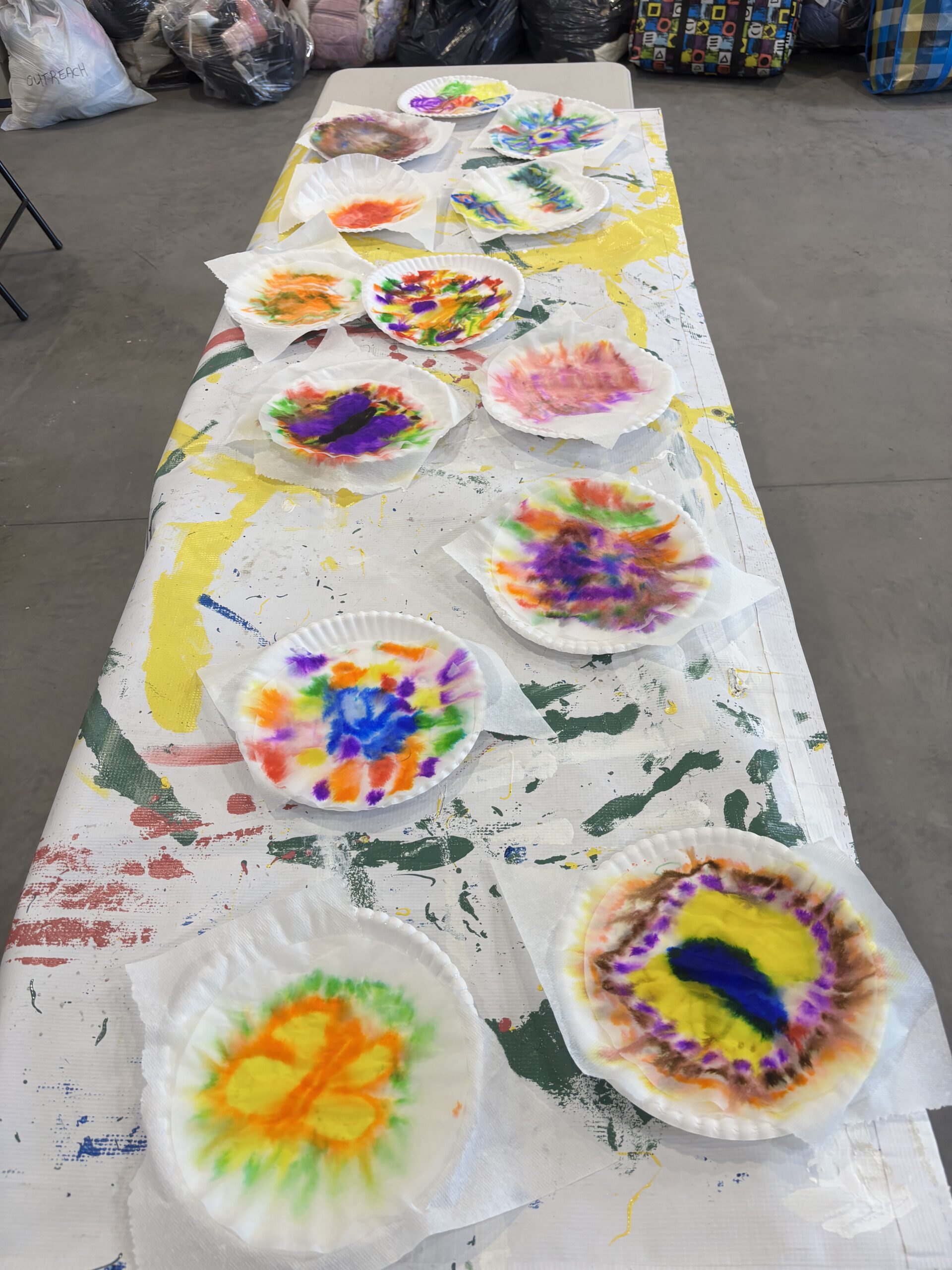 table with the arts and crafts from the participants of the bridge building garden project